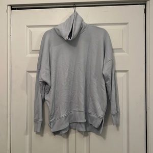 Baby blue sweatshirt.